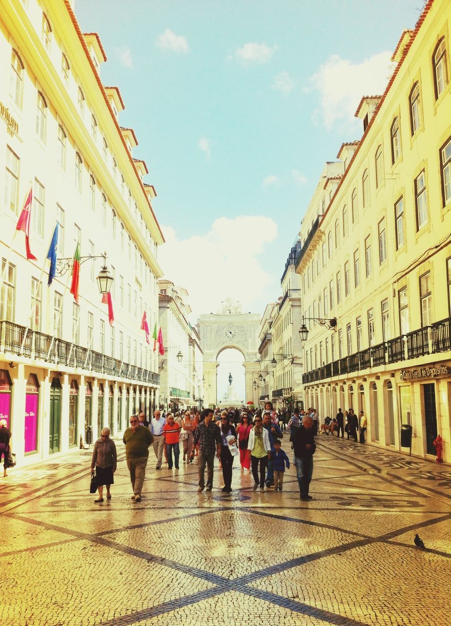 architecture, built structure, building exterior, large group of people, person, men, sky, walking, famous place, place of worship, religion, lifestyles, travel destinations, tourism, mixed age range, spirituality, tourist, city, leisure activity