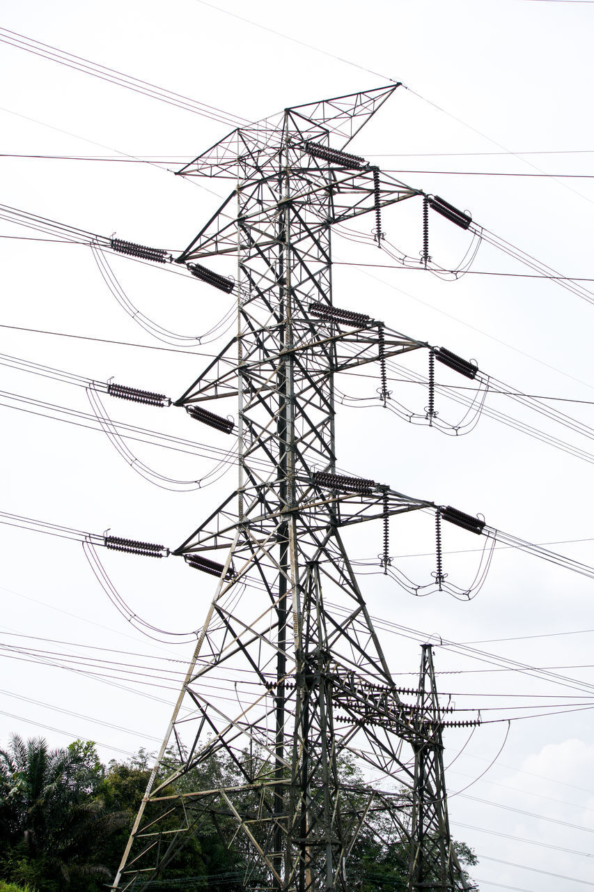 electricity, electricity pylon, cable, technology, power supply, power line, power generation, tower, transmission tower, sky, overhead power line, no people, nature, built structure, low angle view, plant, architecture, outdoor structure, electrical supply, outdoors, line, tree, silhouette, day, outdoor power equipment, mast, electrical grid, in a row, power cable, complexity, high voltage sign, public utility, communication, metal