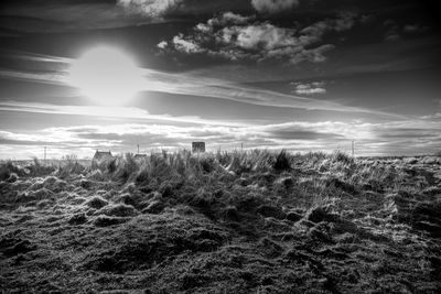 Scenic view of land against sky