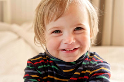 Close-up of cute girl at home