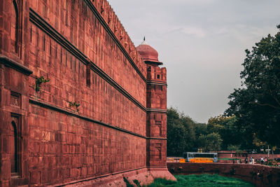 View of red building against sky