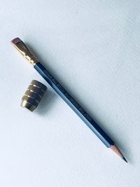 High angle view of pencils on white background