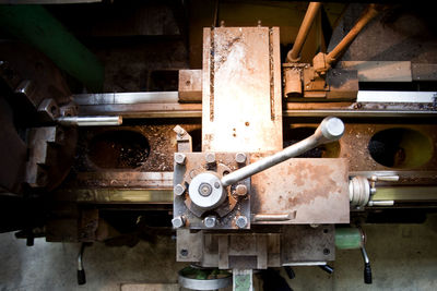 Close-up of old machine part in factory