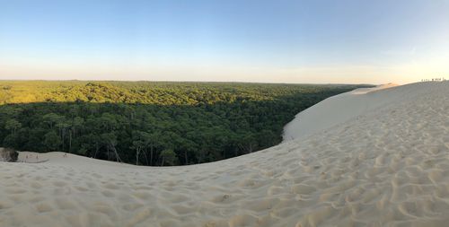 Scenic view of desert against clear sky