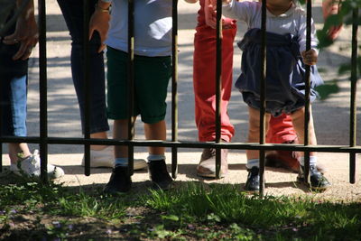 Low section of men standing outdoors