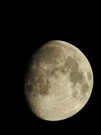 Low angle view of moon against clear sky at night