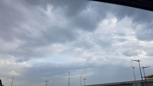 Low angle view of street light against sky