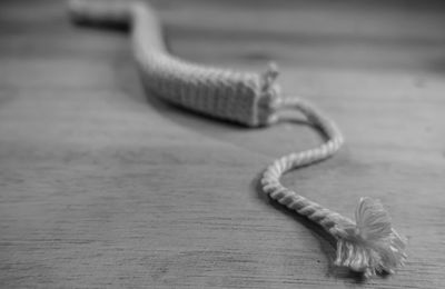 Close-up of rope on table