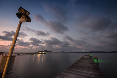 Long jetty leading to calm sea