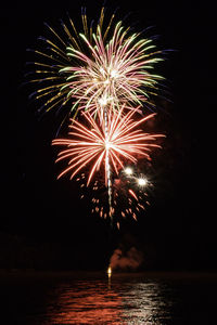 Firework display at night