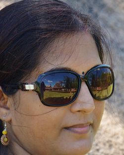 Portrait of woman wearing sunglasses