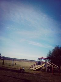 Scenic view of landscape against blue sky