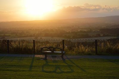 Scenic view of landscape at sunset