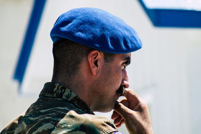 Portrait of young man wearing hat