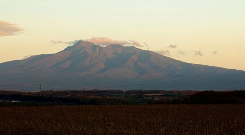 Scenic view of landscape against sky during sunset