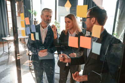 Low angle view of business colleagues working in office