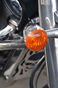 Close-up of orange light bulb