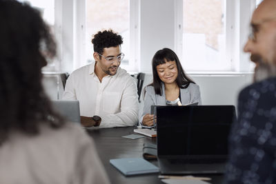 People talking during business meeting