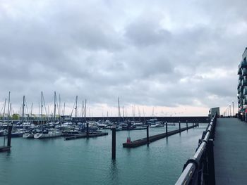 Boats moored at harbor