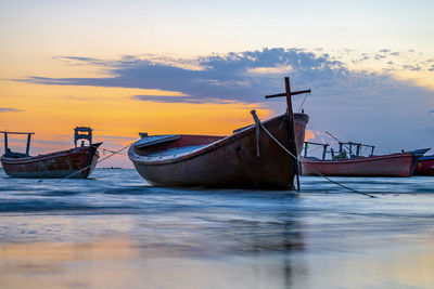 Boat in sea against sky