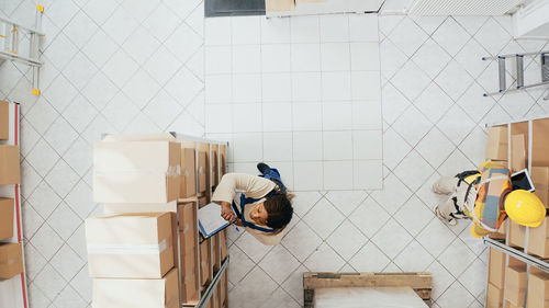 High angle view of people standing in store