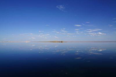 Scenic view of calm sea against sky