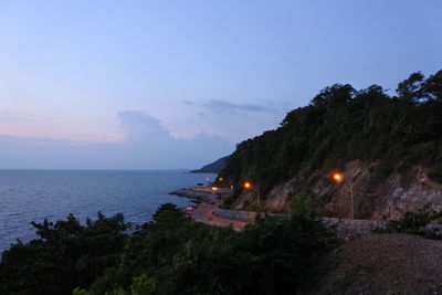 Scenic view of sea against sky at dusk