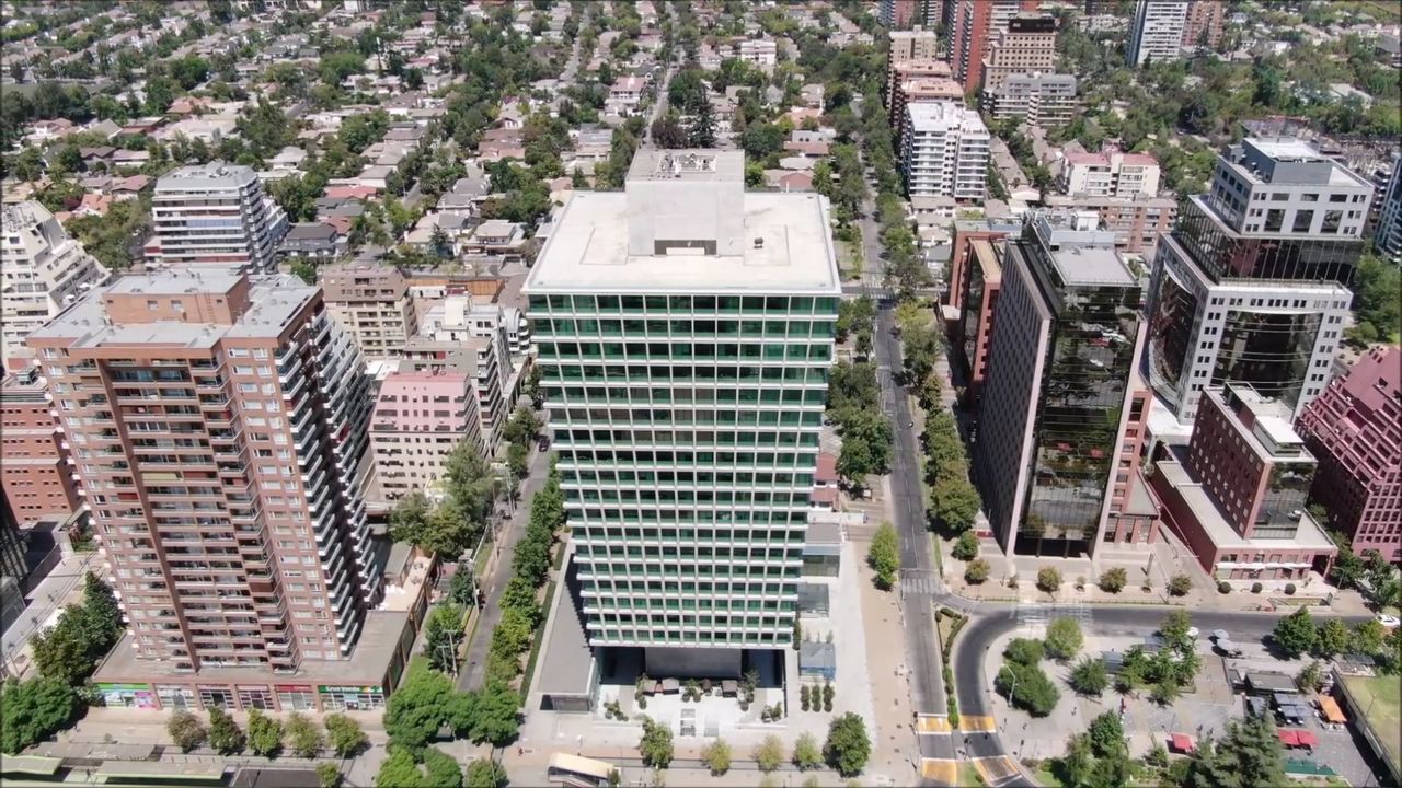 HIGH ANGLE VIEW OF BUILDINGS AGAINST CLOUDY SKY