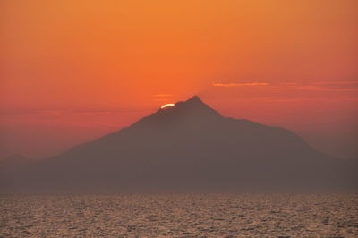 Scenic view of mountains at sunset