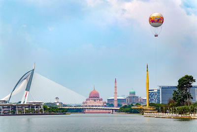 View of buildings against cloudy sky