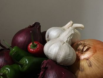 Close-up of vegetables against wall