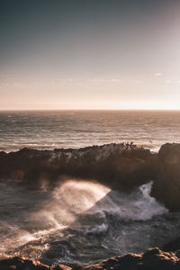 Scenic view of sea against clear sky