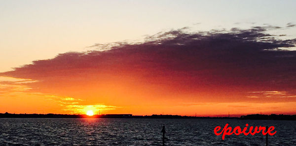 Scenic view of sunset over sea