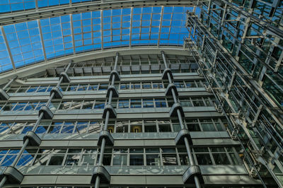 Low angle view of building against blue sky