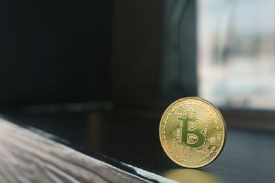 Close-up of coins on table