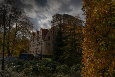 Buildings against sky during autumn
