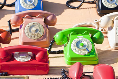 High angle view of old telephone on table