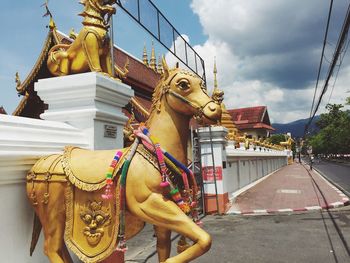 Horse statue outside temple