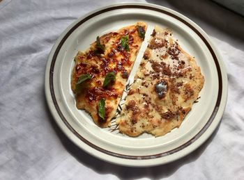 High angle view of pizza on table