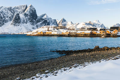 Scenic view of sea and mountains against sky.  lofoten, norway.