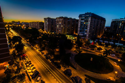 High angle view of illuminated city at night