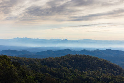 Scenic view of mountains against sky during sunset