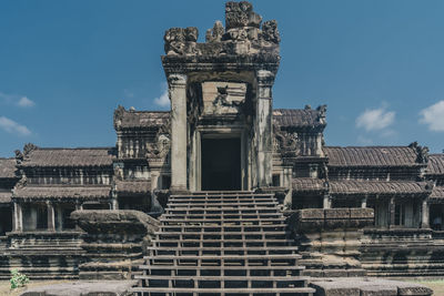 Low angle view of old building against sky