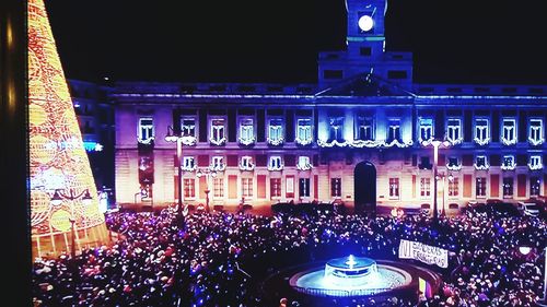 Low angle view of illuminated building at night