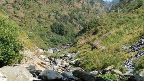 Scenic view of stream flowing through rocks