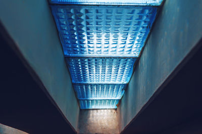 Old glass wall blocks in wall of a soviet-style house. scattered light.