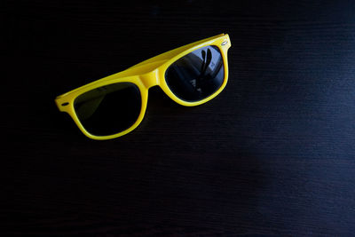 Close-up of sunglasses on table