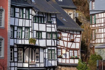 Half-timbered houses along the rur river in monschau, eifel