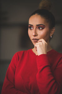 Close-up of thoughtful beautiful young woman