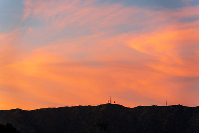 Colorful burbank sunset with silhouette of mountains in the foreground